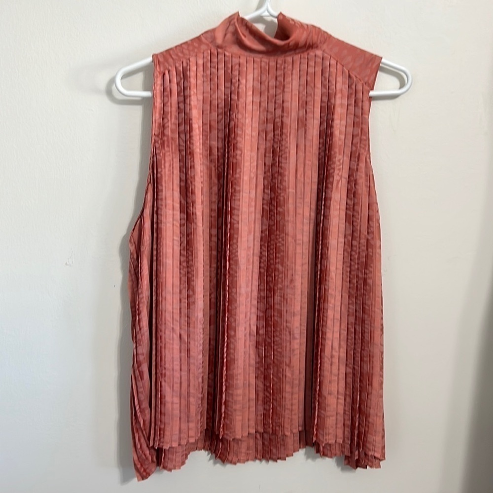 SALMON pink coloured sleeveless blouse